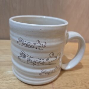 White Ceramic Mug with Airplane Design